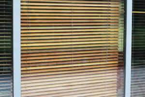 Faux Wood vs Real Wood Blinds in Humid Climates